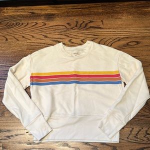 Madewell sweatshirt with retro horizontal rainbow stripes.